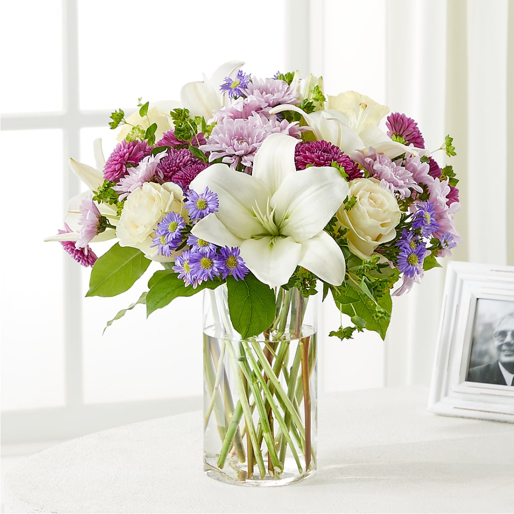 peaceful white lilies basket ftd Wishing Peace Bouquet – ivory, lavender, purple, white flower arrangement | Wakefield, RI
